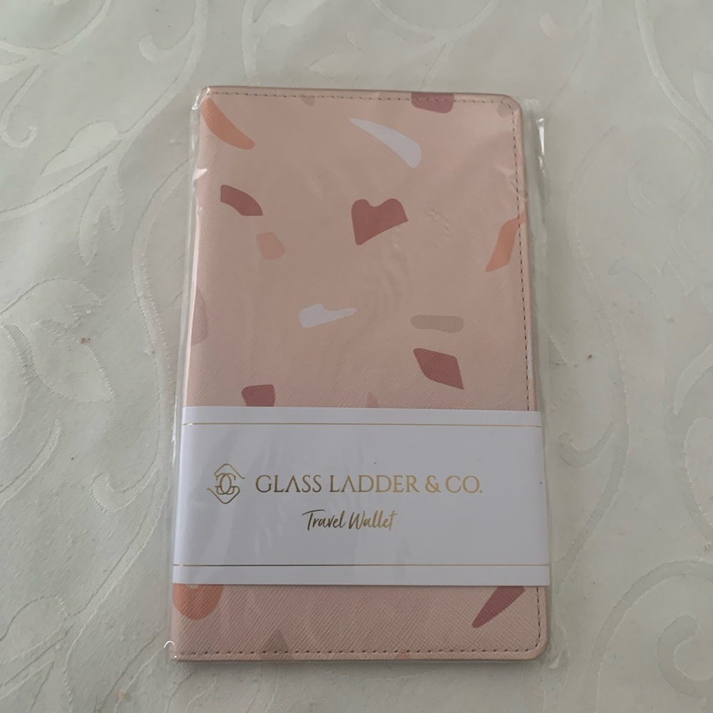 Glass Ladder & Co travel wallet.